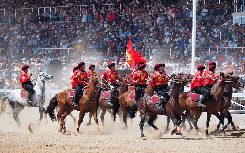 The Kyrgyz kok boru team won the finals at the World Nomad Games and celebrated with a team parade on the horses and flags waving proudly 