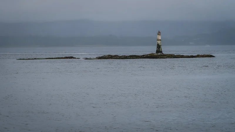The lighthouse off the coast of Dunoon on a grey morning in Scotland 