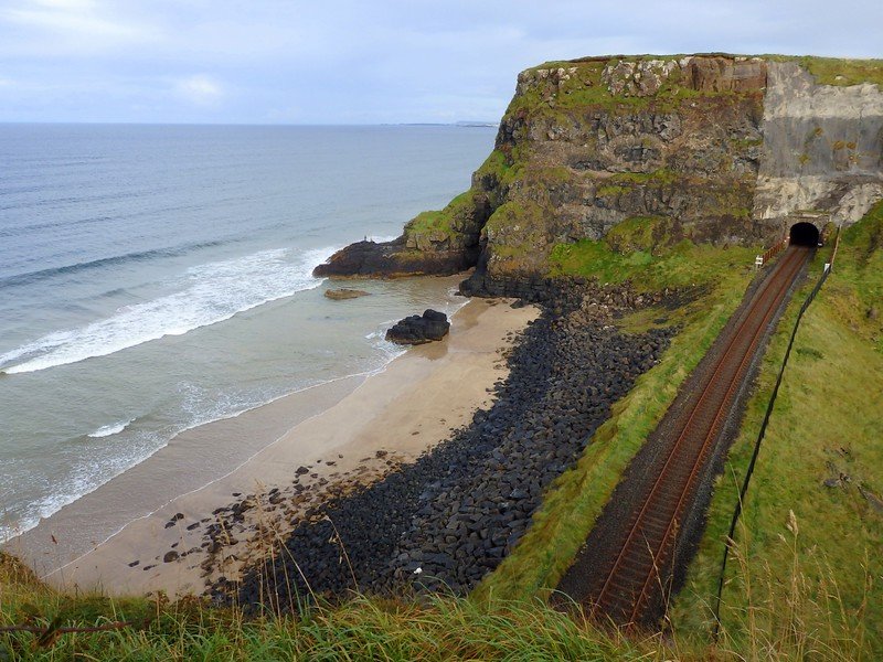 The rail tracks along the coast of Northern Ireland where you have spectacular coastal views overlooking the beach from a high vantage point