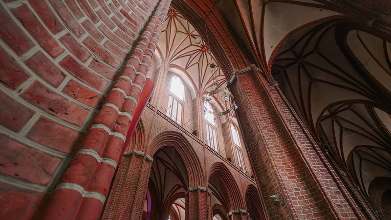 The red brick architecture of the basilica of St. Nikolai in Luneburg, Germany is a distinct feature 