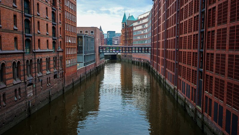 The red-brick warehouses of Speicherstadt in Hamburg, Germany are the most iconic views in the city for pedestrians The red-brick warehouses of Speicherstadt in Hamburg, Germany are the most iconic views in the city for pedestrians