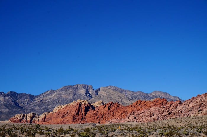 The Red Calico Hills at Red Rock Canyon, Nevada featuring colourful mountains and a deep blue sky 