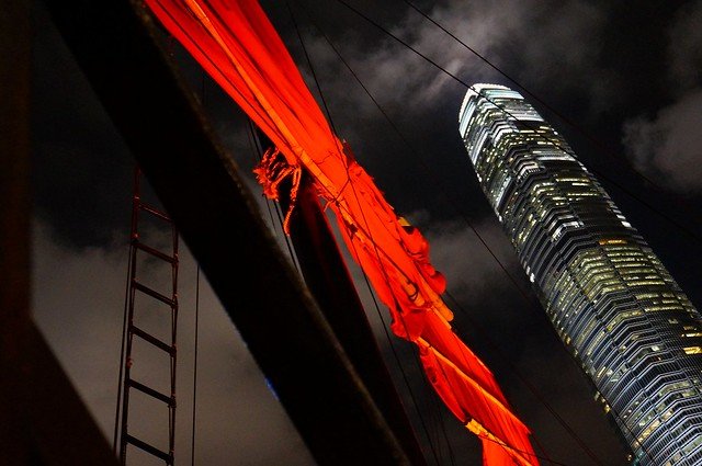 The red sails of the Aqua Luna during our evening cruise of Victoria Harbour, Hong Kong