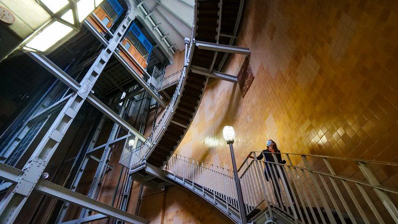 The stairs leading to the Old Elbe Tunnel in Hamburg are steep and zigzagging with That Backpacker Audrey Bergner going upwards The stairs leading to the Old Elbe Tunnel in Hamburg are steep and zigzagging with That Backpacker Audrey Bergner going upwards