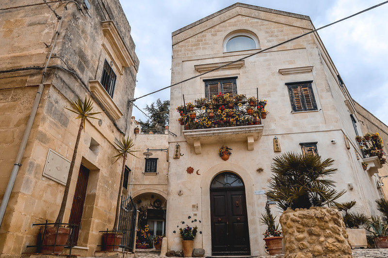 The streets of Matera, Italy with distinct buildings at every corner The streets of Matera, Italy with distinct buildings at every corner