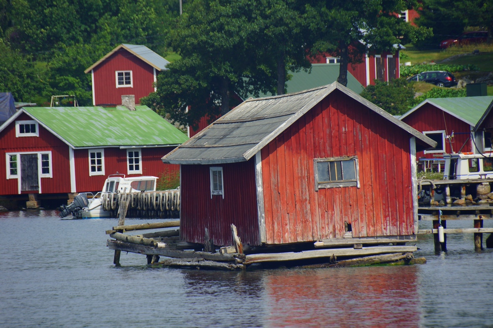 The Viking Village of Rosala with red and green buildings located in the Kimitoön Archipelago of Finland