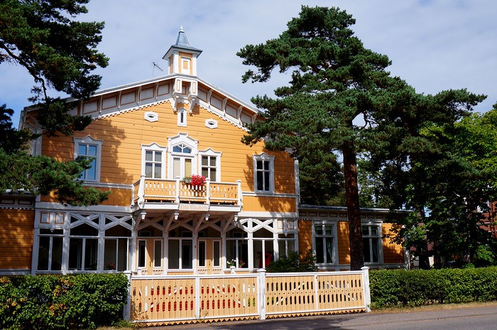 The wooden villas of Hanko in Finland beautifully maintained and preserved with bright summer colors 