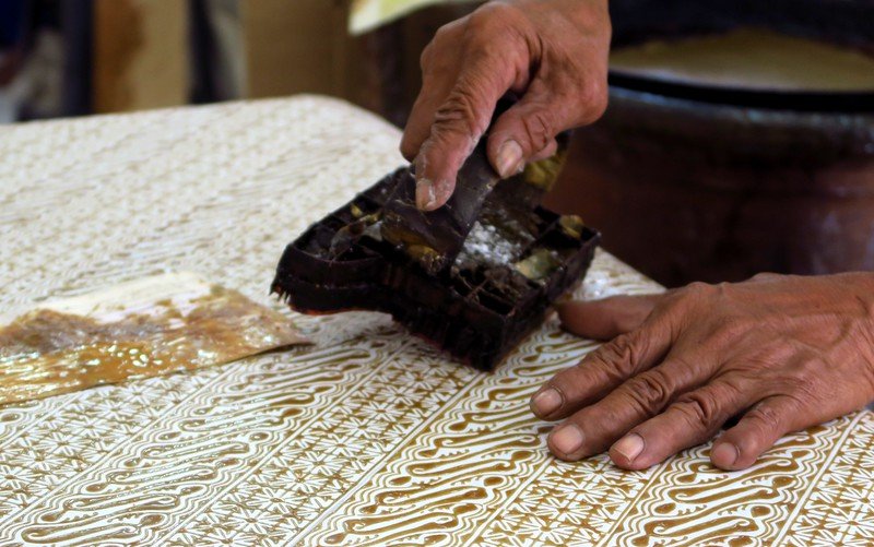 The workshop inside the House of Danar Hadi where batik are made by hand with precision and skill retaining culture through generations in Indonesia