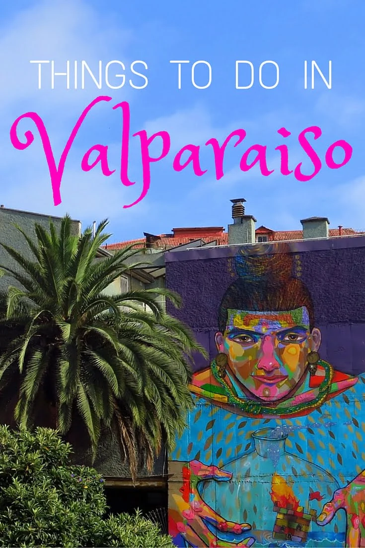 Things to do in Valparaíso, Chile — vibrant mural street art with palm trees in the city’s bohemian port district.