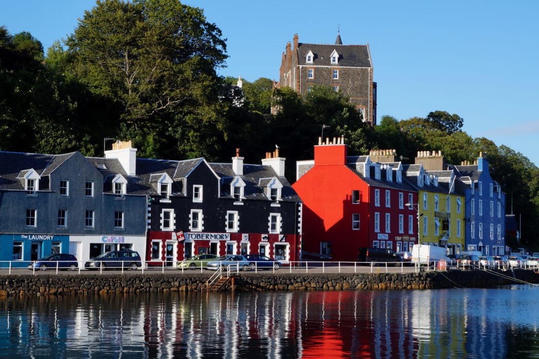 Toberymory Harbourfront located on the Isle of Mull with distinct architecture and reflections on the water