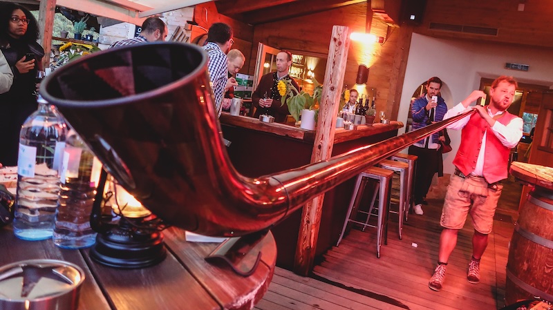 Traditional long horn during social scene in Tirol, Austria 