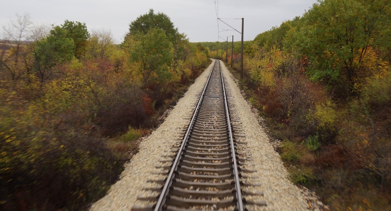 Train tracks views in Europe with autumn colours in full view 
