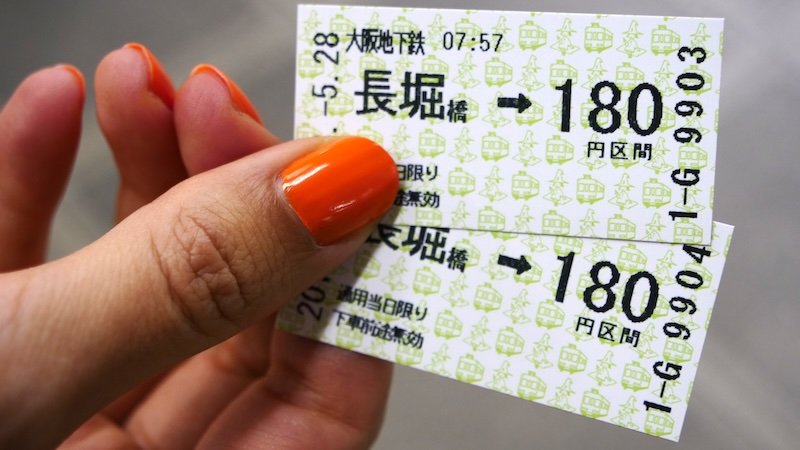 Two train tickets to Nara in That Backpacker Audrey Bergner's hands for a day trip to Japan Two train tickets to Nara in That Backpacker Audrey Bergner's hands for a day trip to Japan