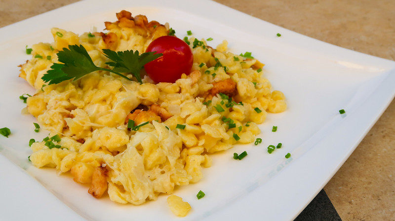 Tyrolean Dishes to Try - Käsespätzle or Kasspatzln is one of the cheesiest and most delicious of them all and the perfect comfort food