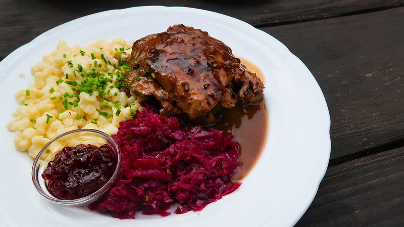 Tyrolean foods to try - Hirschfleisch or deer meat is a protein infused meal that is paired with colorful and tasty sides in Austria 