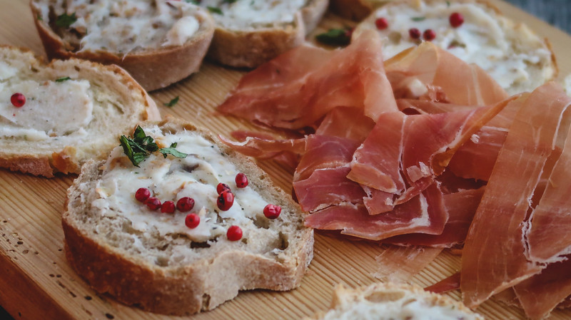 Tyrolean foods to try - Marend which is a snack spread with meats, cheeses and bread and reminds us so much of picada from Argentina