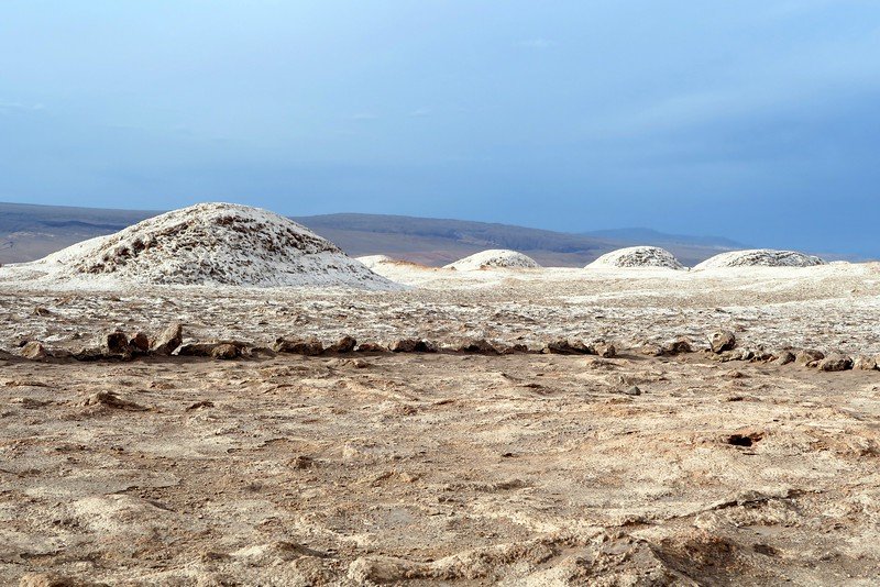 Salt-encrusted domes in Valle de la Luna, Atacama Desert, Chile, showcasing the unique lunar-like landscapes
