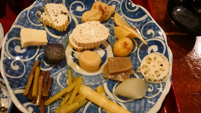 Vegetarian food in Takayama at Local Cuisine Hisadaya beautifully and symmetrically presented on the plate in front of us in Japan