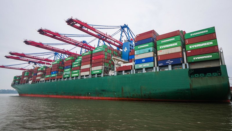 Viewing the cargo ships loaded with containers on a boat tour of Hamburg's port in Northern Germany Viewing the cargo ships loaded with containers on a boat tour of Hamburg's port in Northern Germany