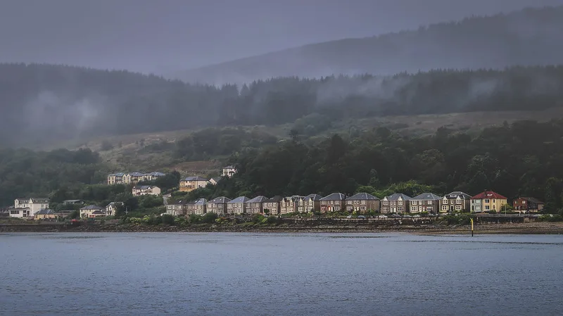 Views of Dunoon in the early morning with lake views and homes off in the distance with a distinct mist