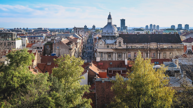 Views of Zagreb from Upper Town with lush greenery in the foreground and traditional architectural gems in the background in Croatia
