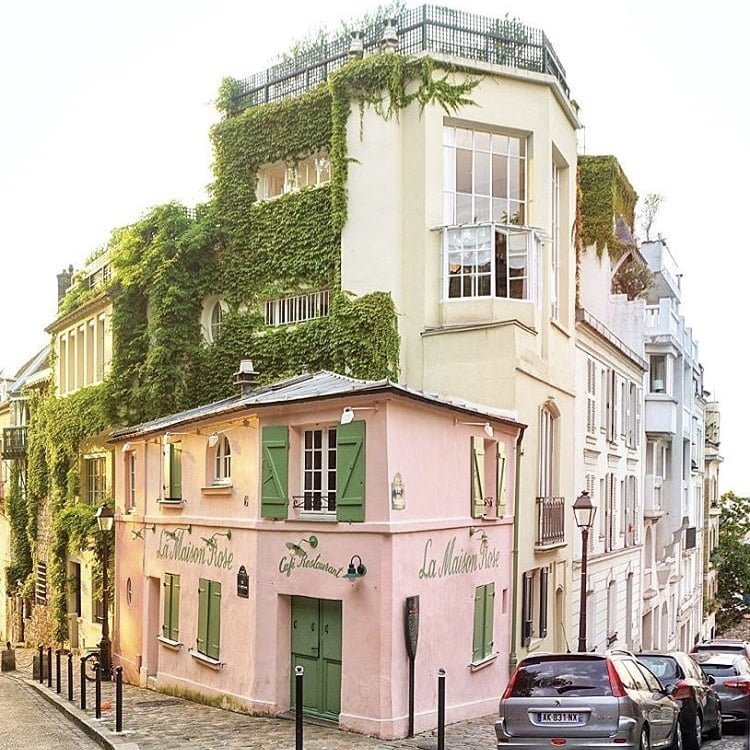 Visit Montmartre, one of the coolest neighbourhoods in Paris with buildings covered in ivy and unique designed 