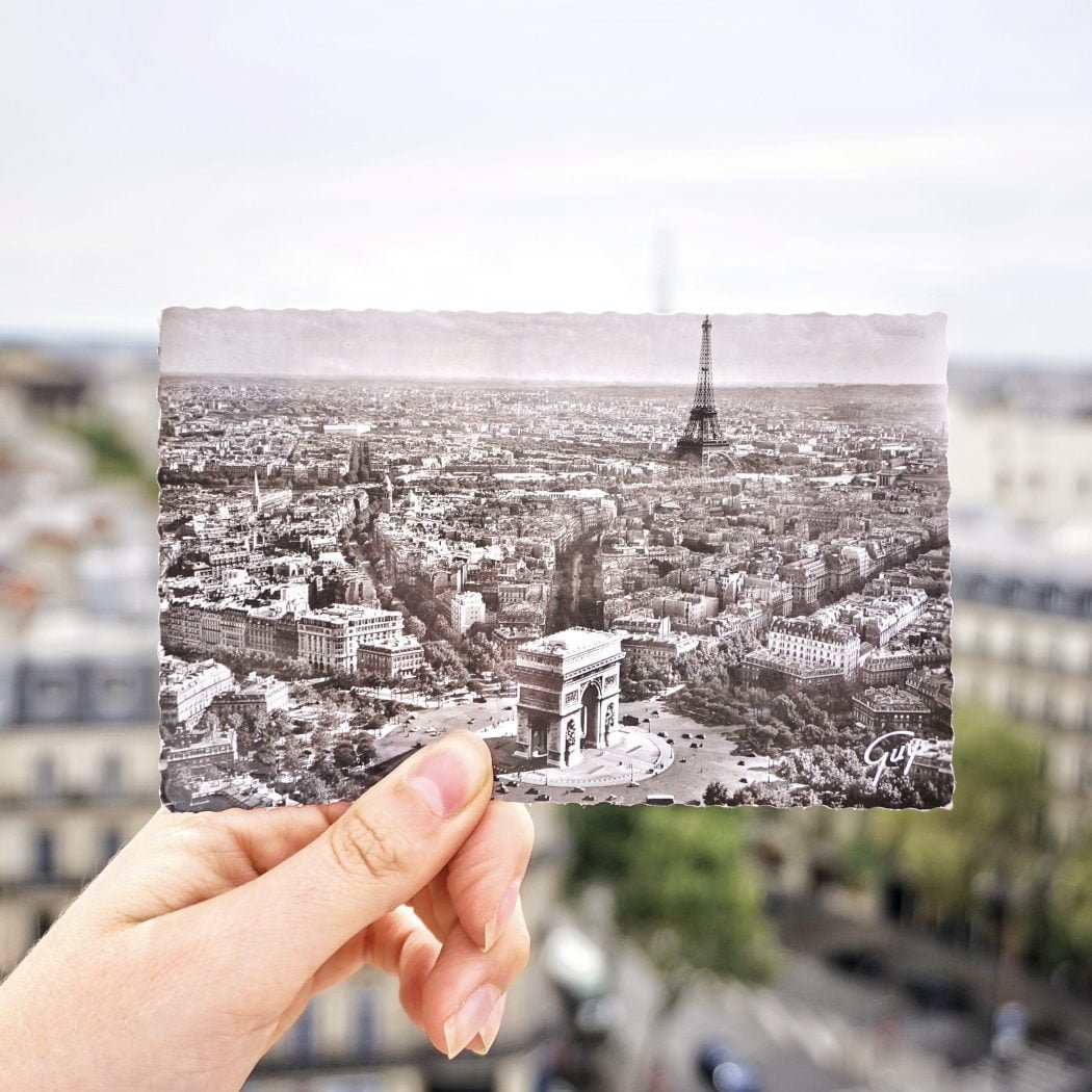 Visit the flea market of Port St. Ouen with a postcard souvenir bokeh photo in Paris, France 