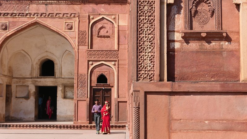 Visiting Agra Fort with distinct views of its facade from a wide angle perspective in Rajasthan