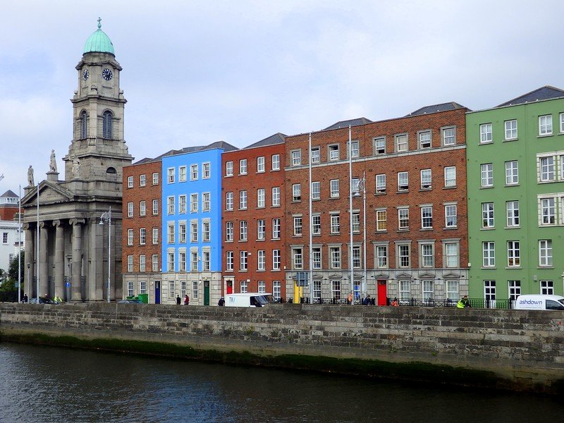 Visiting Dublin with its colorful buildings lined along the river is quite impressive 