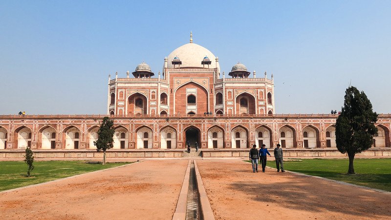 Visiting Humayun's Tomb in Delhi with its full grandeur on display and colours that match and blend in with the dirt of the ground in India