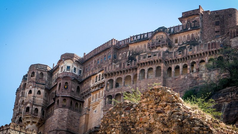 Visiting Mehrangarh Fort in Jodhpur with its imposing and grand facade from a low vantage point in India