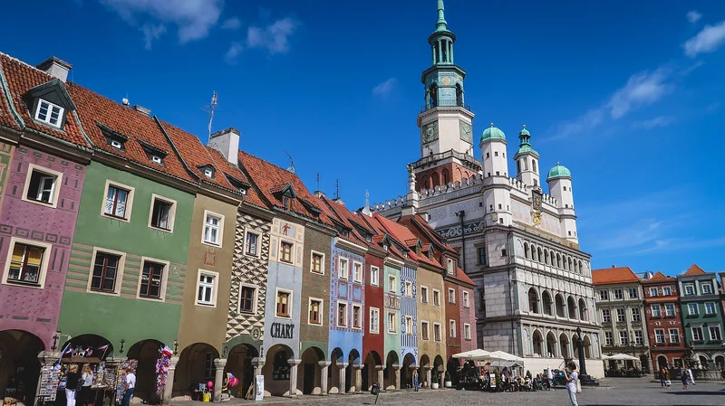 Visiting Poznan's Old Market Square with a range of colorful buildings in Poland Visiting Poznan's Old Market Square with a range of colorful buildings in Poland