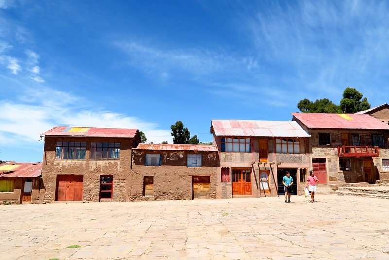 Visiting Taquile on Lake Titicaca with its humble homes on display in Peru 