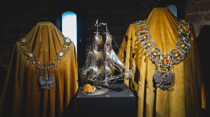 Visiting the Amber Museum in Gdansk where you can see ship monuments and ornate jewelry in Poland