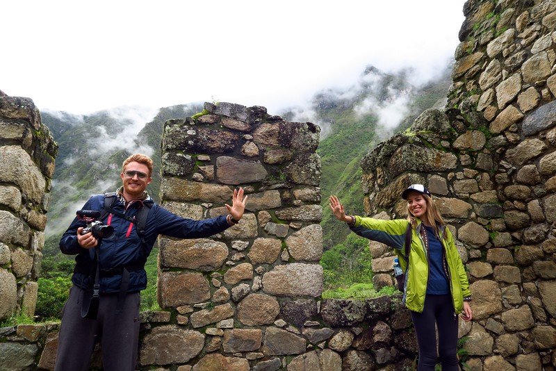 Visiting the Chachabamba on our 2 day Inca Trail, Peru is a smiling Nomadic Samuel and Audrey Bergner That Backpacker 