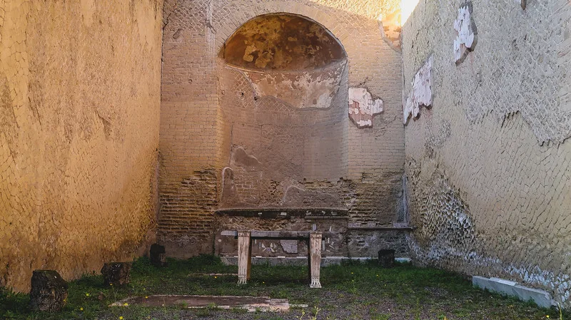 Visiting the ruins of Herculaneum with views of a bench in Italy Visiting the ruins of Herculaneum with views of a bench in Italy
