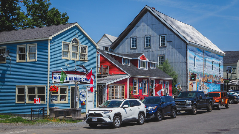 Visiting the seaside town of St. Andrews in New Brunswick with colorful buildings covered in unique maritime murals and street art