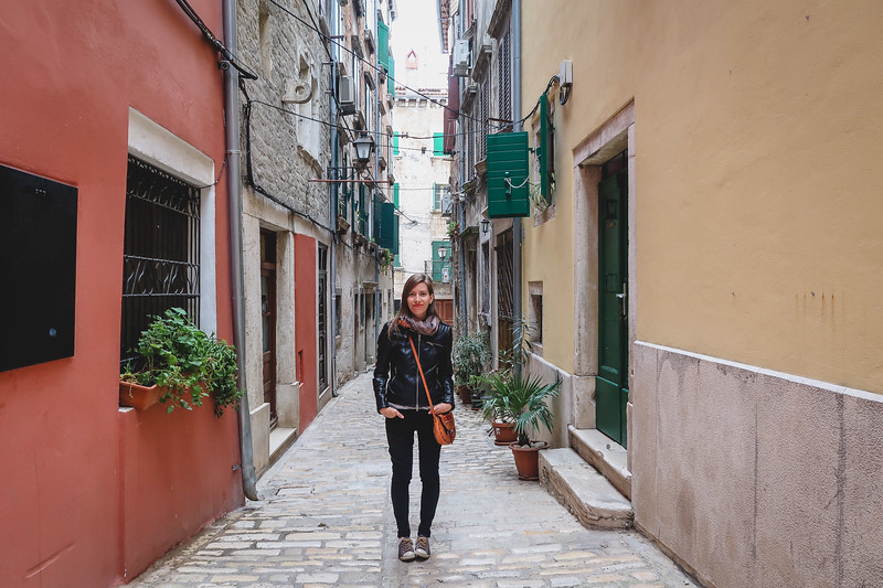 Walking the narrow streets of Rovinj on our day trip is a happy That Backpacker Audrey Bergner excited to visit a new destination in Croatia