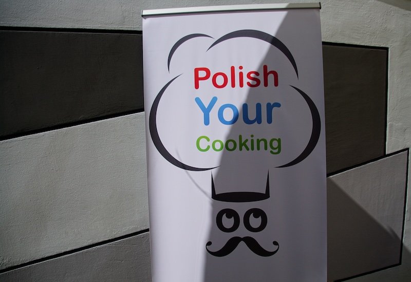 Banner for Polish Your Cooking in Warsaw, Poland, a hands-on cooking school where travelers can learn to make traditional Polish dishes like pierogi and bigos, offering authentic culinary experiences for food lovers visiting the city