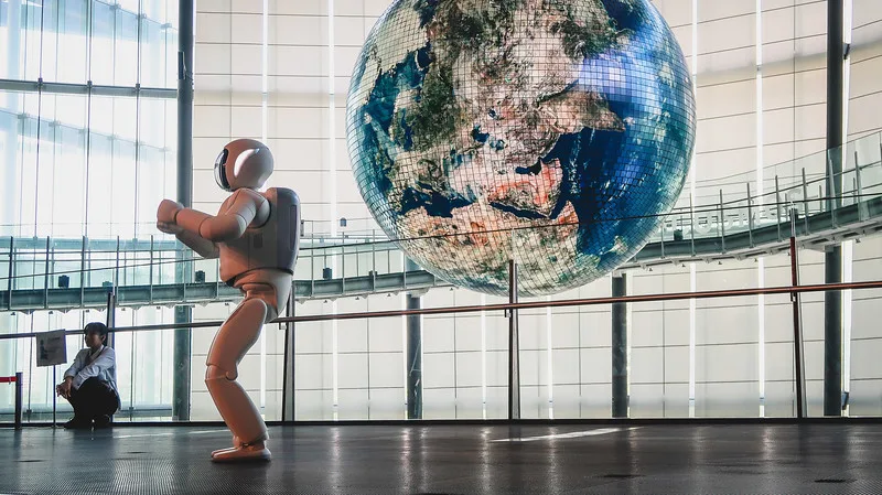 Watching a performance by Asimo on our day trip to Odaiba from Tokyo in Japan Watching a performance by Asimo on our day trip to Odaiba from Tokyo in Japan