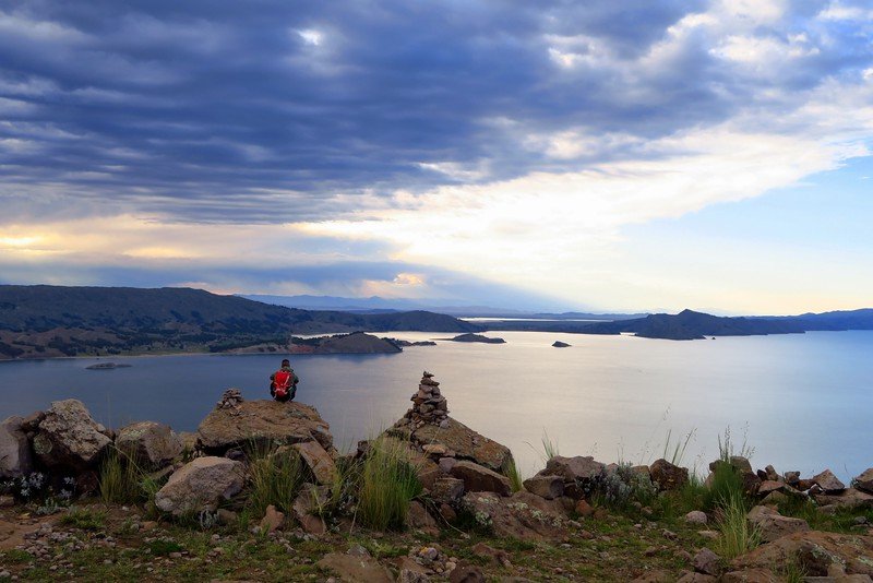 Watching the sunset from Pachamama on Amantani whilst visiting Lake Titicaca, Peru with incredible views and total serenity and peace