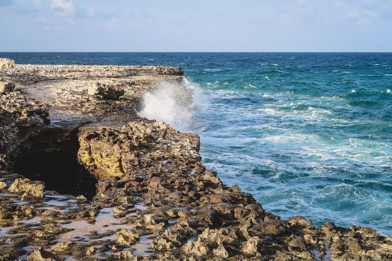 Waves crashing into the coast in Antigua Waves crashing into the coast in Antigua