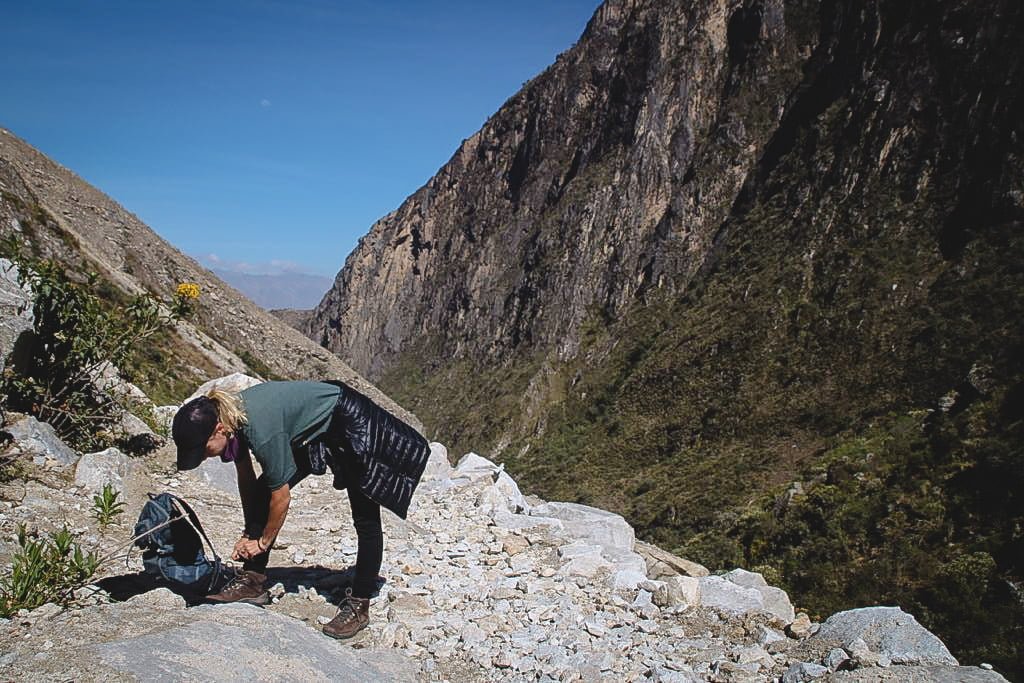 What to pack for the Santa Cruz Trek in Peru including hiking boots and backpack along with clothing layers for both warmth and cooler temperatures 