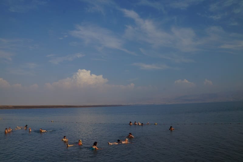 Wide angle view of the Dead Sea showcasing the vastness of the sea and clouds in Israel 