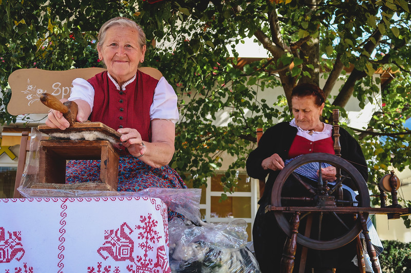 Women showcase their traditions at the festival in Reith im Alpbachtal with smiles and dedication modelled for spectators 