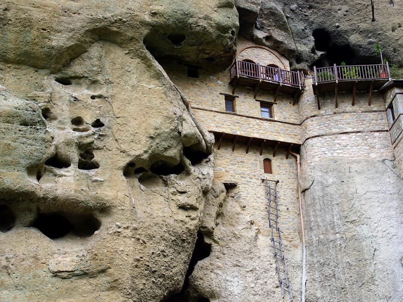 Wooden ladders to reach the buildings in Meteora, Greece 