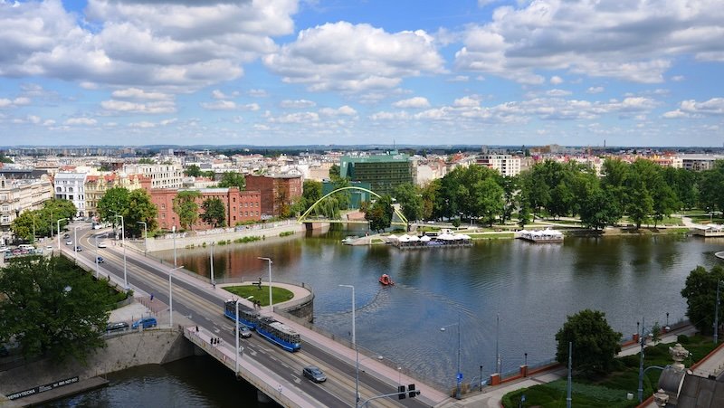 Wroclaw modern city views with trams crossing the bridge in Poland 