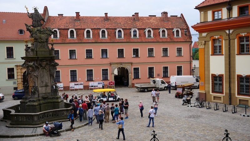 Wroclaw tourists and pedestrians gather around distinct landmarks in Poland 