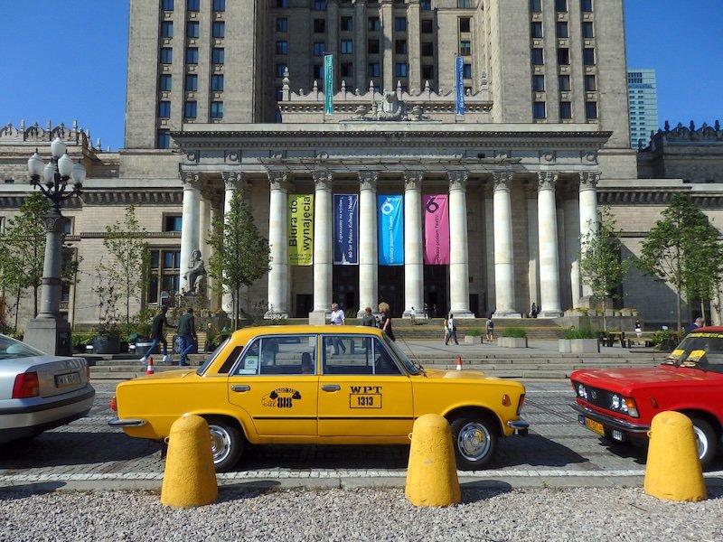 Yellow taxi cab as an option for transportation to get around Warsaw, Poland 