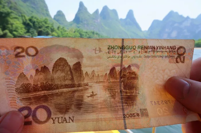 You can see the Li River and the karst mountains pictured in the 20 yuan bill that we held in our hand to match the scenery we experienced